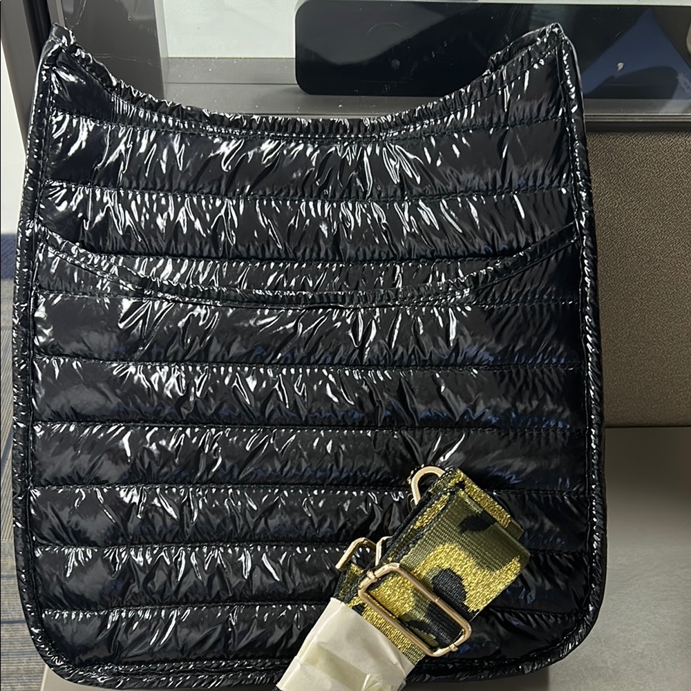 Luxurious Black Quilted Shoulder Bag with Gold Accents